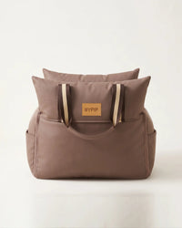 Mellow Car Seat in taupe, front view with BYPIP label and striped handles